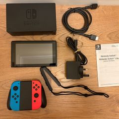 Nintendo Switch + charger+ 6 Games + hard shell case