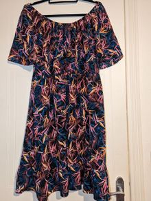 gorgeous floral summer dress. Can be worn normally or off shoulder.