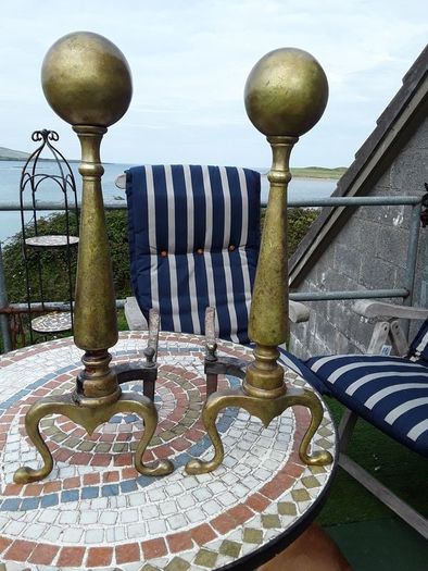 Antique brass fire dogs