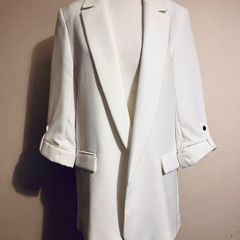 Zara ecru blazer with rolled- up sleeves.