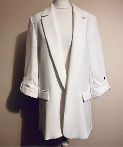 Zara ecru blazer with rolled- up sleeves.