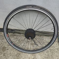 28" electric rear wheel with good tires 36v/350w needs  few spoke to be replaced but works