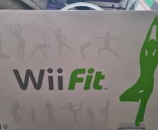 Nintendo Wii console with balance board and 21 games