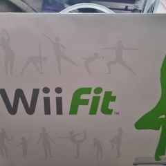 Nintendo Wii console with balance board and 21 games