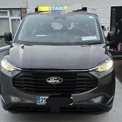 Ford Custom  9 Seater Plug in Hybrid Taxi