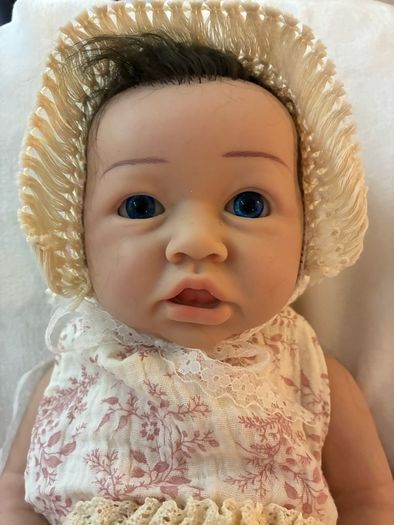 doll.       Very cute full bodied silicone reborn doll