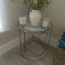 Harrison Nickel and Glass Nest of Tables Harrison Nickel and Glass Nest of Tables   Add a bespoke focal point to your living room, with these beautiful Nickel and Glass Nest of tables.   Dimensions:   Small Table: Diameter 40cm Height 45cm   Large Table: Image 2