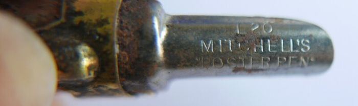 Vintage dip pen with collection of assorted nibs