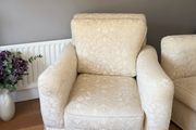 Cream and white floral armchair