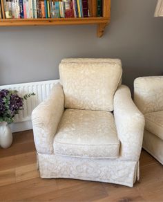 Cream and white floral armchair