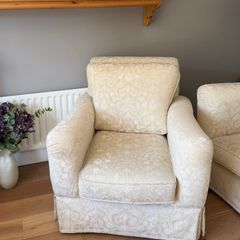 Cream and white floral armchair