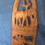 Hand-carved wooden wall hanging Image 3