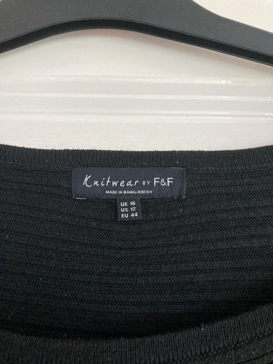Black batwing jumper