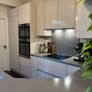 KUBE Modern High-Gloss Kitchen & AEG Appliances Image 6