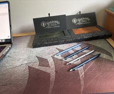 Two Galen Leather B6 notebooks and four Pilot Acro 1000 pens