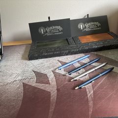 Two Galen Leather B6 notebooks and four Pilot Acro 1000 pens