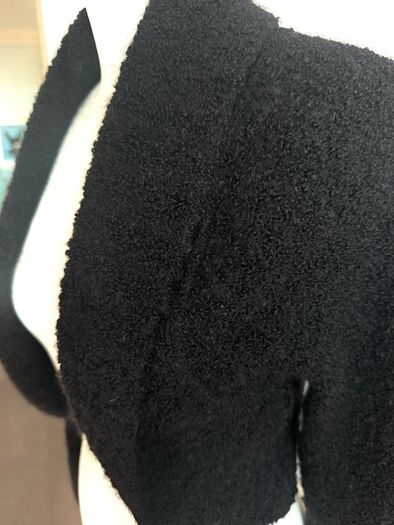 Louise Kennedy shrug