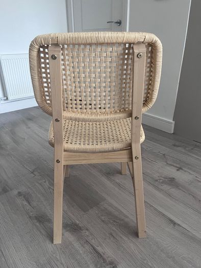 Four Voxlov IKEA light bamboo dining chairs