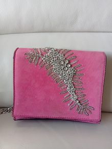 Pink suede diamante embellished bag with chain strap.