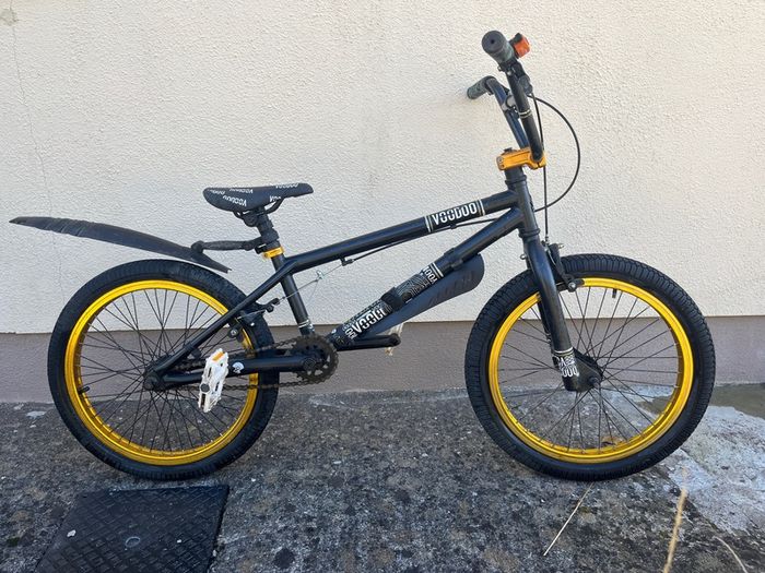Kids black BMX bike