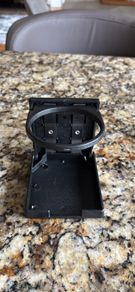 Bolt on foldable cup holder
