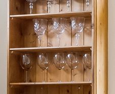 Wooden open shelving unit/glasses display.