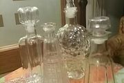 Four Glass Decanters with Stoppers