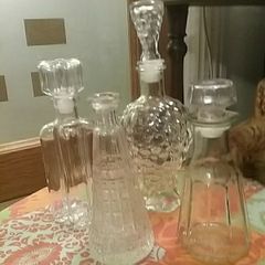 Four Glass Decanters with Stoppers