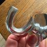 Large silver coloured hanging hook with screws and raw plugs Image 4