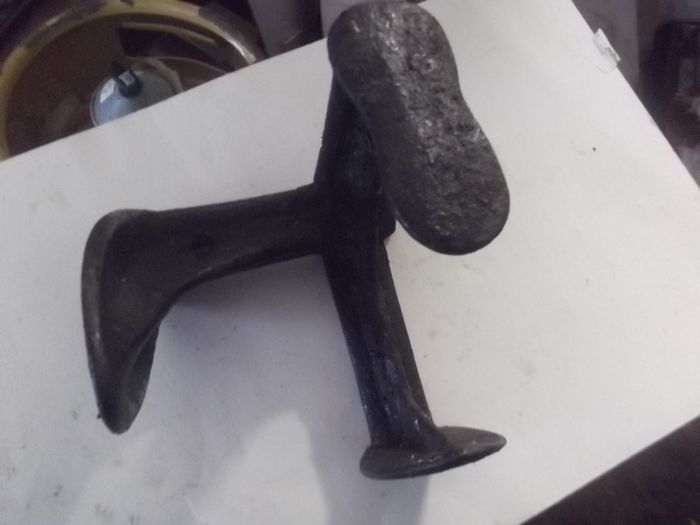 a antique cast irion shue maker  lass