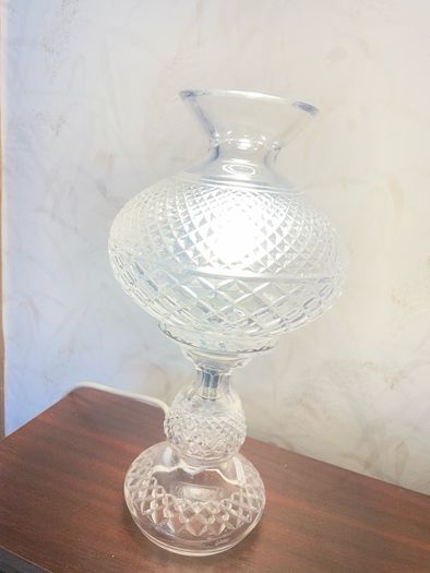 Elegant vintage cut glass electric table lamp in a classic hurricane