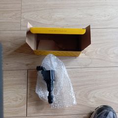 4 x Brand new ignition coils (Hella)