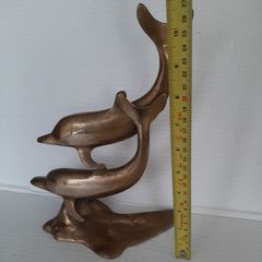 Lovely vintage brass dolphins couple