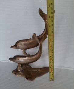 Lovely vintage brass dolphins couple