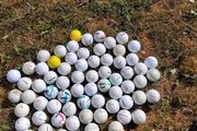 65 assorted golf balls