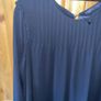 Dress M&S, black, long sleeves, very dressy, round neck with pleated detail at top. Image 2