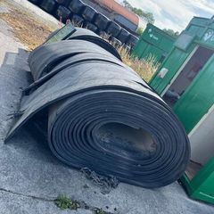 Rolls of rubber & crane skips