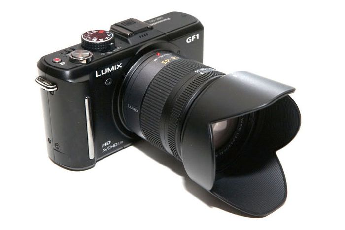 Panasonic Gf1 Working But Needs A Battery Latch Fitted Other Wise Its Fully Working ,comes With Charger And Leather Cover Case Branded With Pansonic Logo