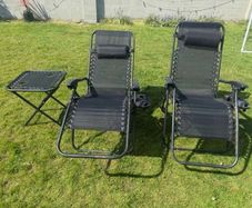 2 black recliner garden chairs