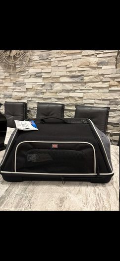 Pet carrier , dog