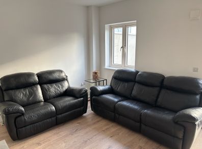 Recliner leather sofa set