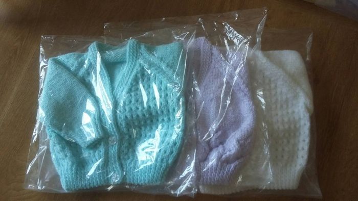 Beautiful hand knitted baby cardigans