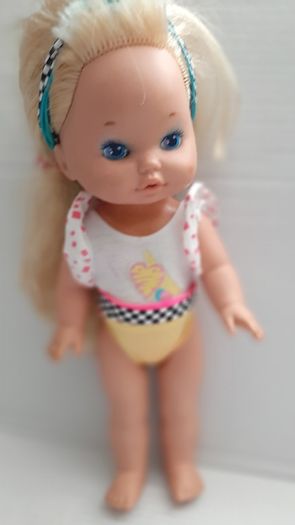 collectable vintage matel doll in original clothes