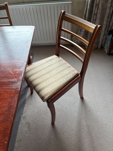 mahogany dining table and 3 chairs