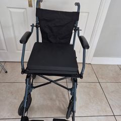 Wheelchair with padded cushion