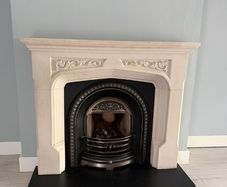 Stone fireplace, insert and granite hearth