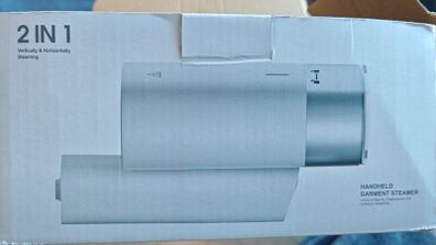 Handheld garment steamer