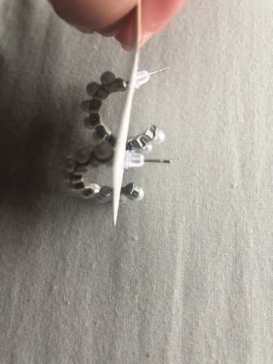 silver colour Earrings with pearl detail