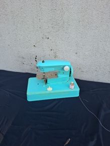 Kid vintage toy sewing machine