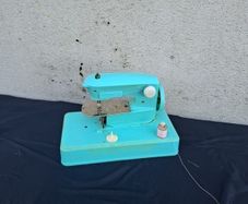Kid vintage toy sewing machine